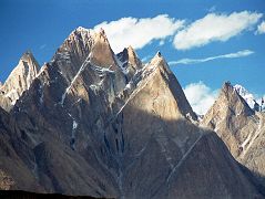 04 K2 Pokes Out To The Right Of The Cathedral Just Before Sunset From Paiju I was admiring the Cathedral and a bit of the Lobsang Spire in the late afternoon from Paiju when I noticed a tall peak far away poking out in the distance. I strained my eyes and couldnt believe it  its K2.